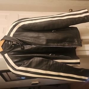 Wilson's leather jacket, size medium. Black with white stripes on sleeves